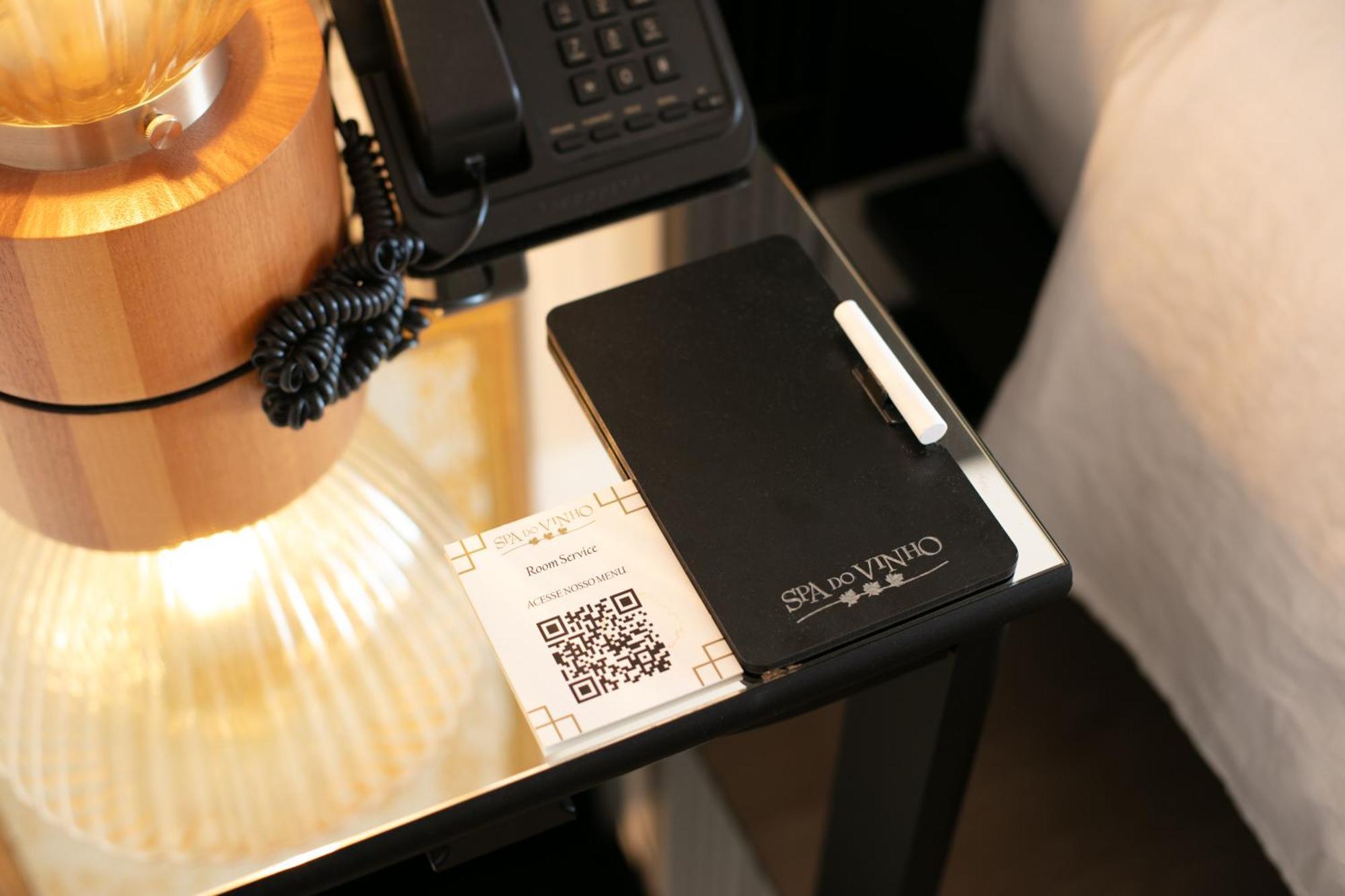 Spa Do Vinho Condominio Vitivinicola Bento Goncalves Exterior photo A QR code on a hotel room service card