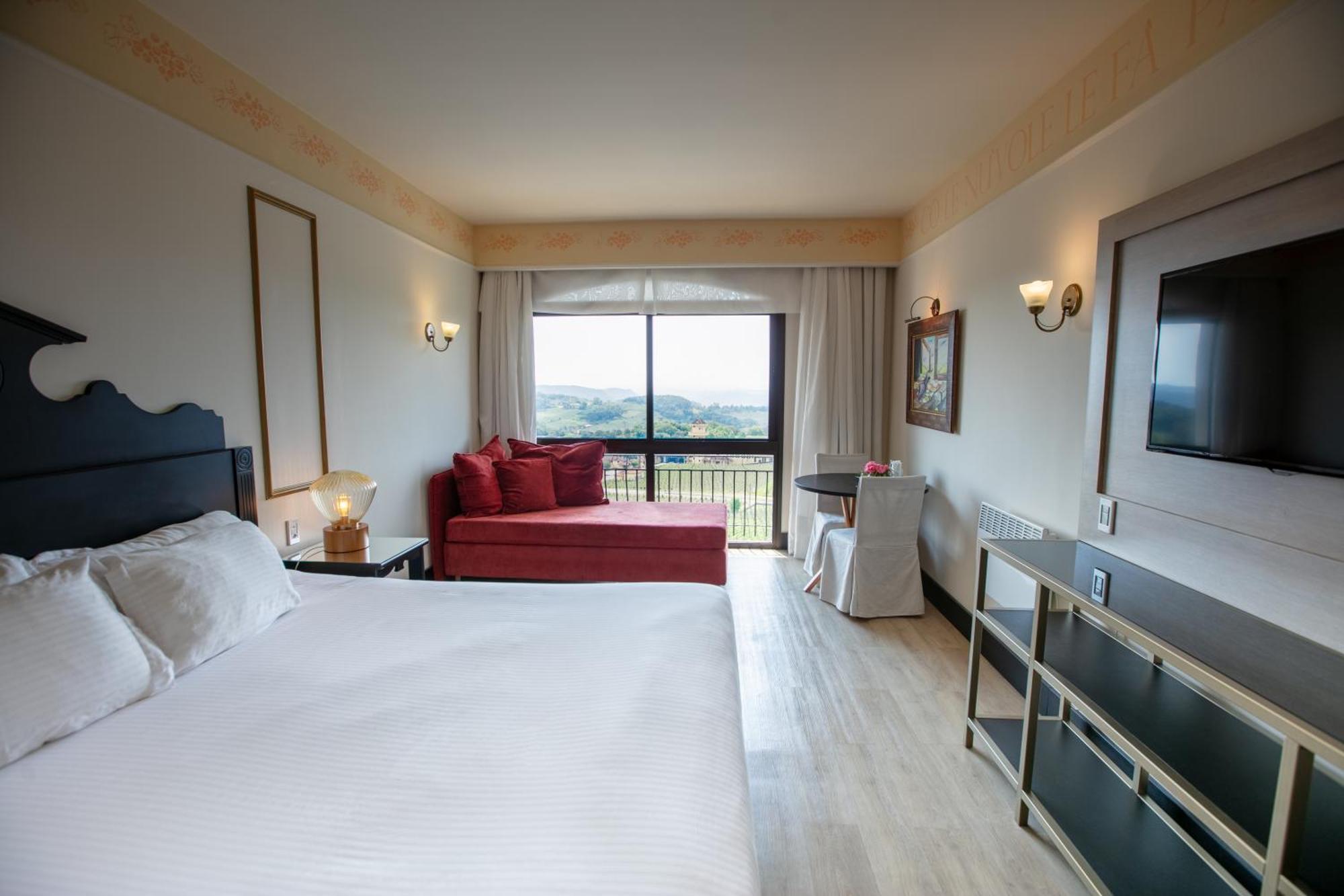 Spa Do Vinho Condominio Vitivinicola Bento Goncalves Exterior photo A room at the hotel
